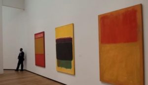 A group of paintings on a wallAI-generated content may be incorrect.